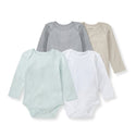Set of four long-sleeve baby bodysuits in gray, cream, mint, and white.