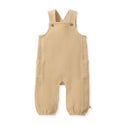 Tan knit corduroy baby jumpsuit with front bib, shoulder snaps, and pocket details