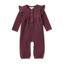 Girls thermal jumpsuit in burgundy with ruffled shoulders, long sleeves, button front