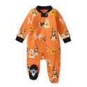 Orange organic cotton footed romper with dog costume print, black cuffs and snap front