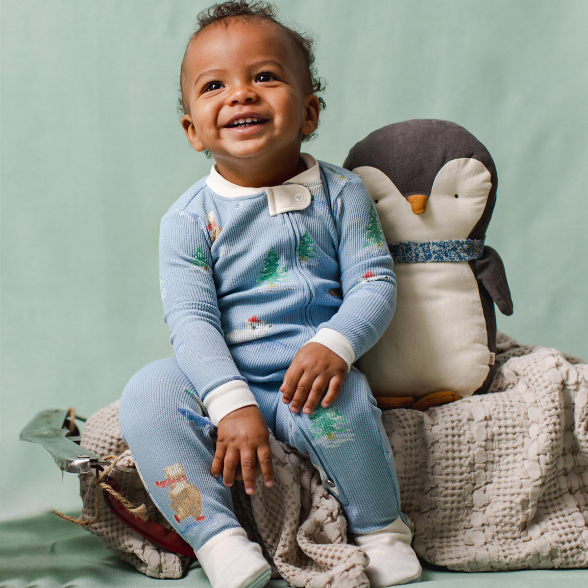 Light blue footed zip sleeper with winter bear print and white snap placket, soft cuffs - View 2