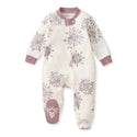 Footed sleep and play pajama in white with lilac cuffs and snowflake print