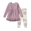 Mauve ruffle tunic dress with long sleeves and cream leggings with grey snowflakes