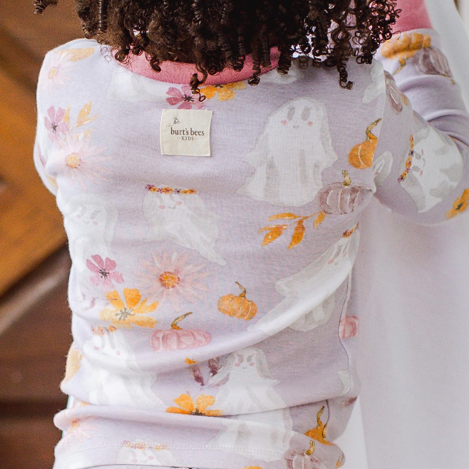 Lavender pajama top with ghost, pumpkin, and flower print; burt's bees neck label - View 2