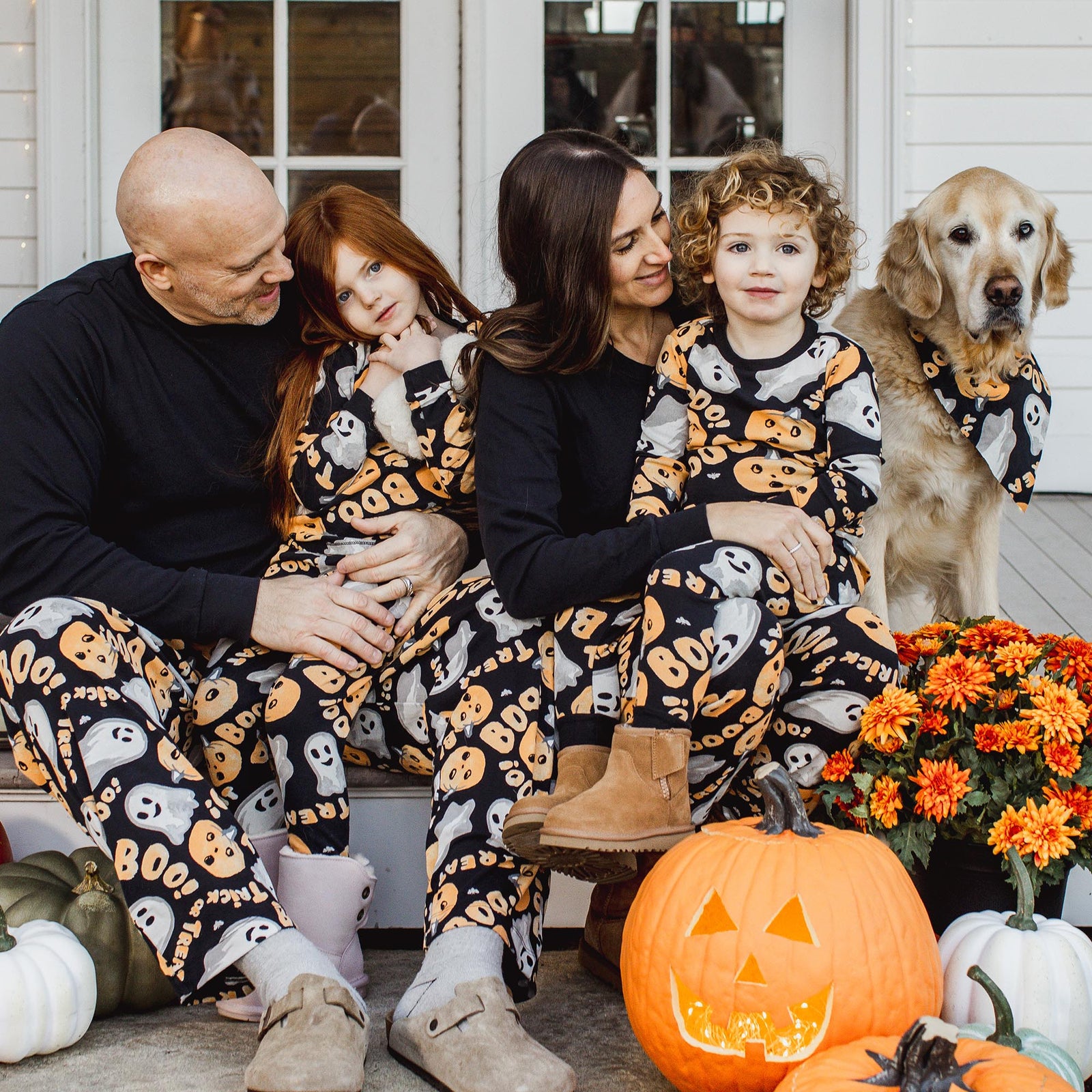Kids' two-piece long-sleeve pajama set in dark navy with playful Halloween character print - View 2