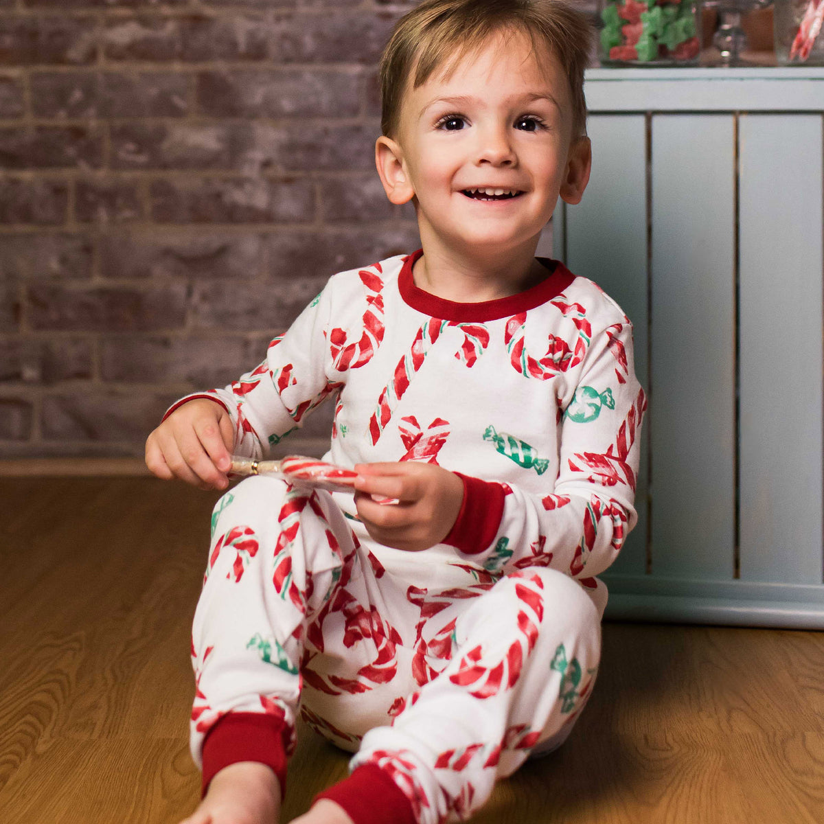 Kids’ two-piece pajama set with candy cane print, long-sleeve top and matching pants - View 2