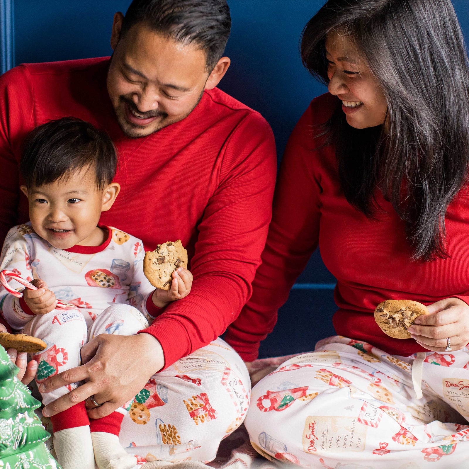 Kids organic cotton pajama set in white with colorful cookies, red cuffs and long sleeves - View 2