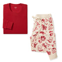 Women's organic cotton pajama set with red long-sleeve top and cream red holiday-print pants