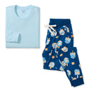 Women's organic cotton pajama set with light blue long-sleeve top and blue printed pants